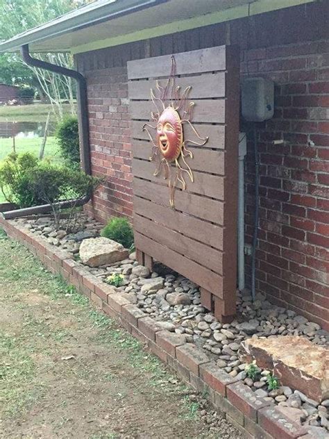 how to hide ugly electrical box outside|how to hide eyesores outside.